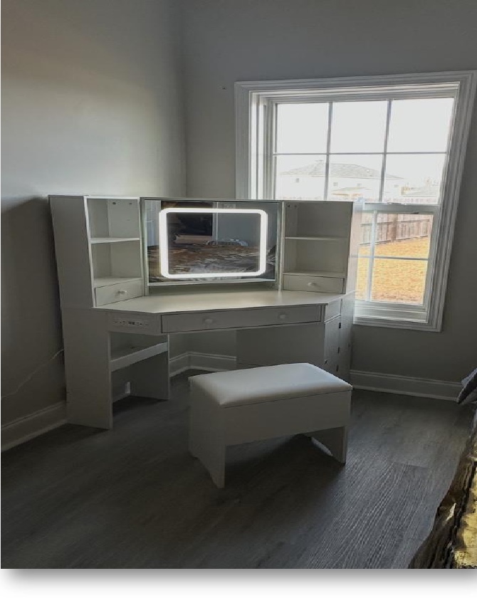Completed vanity station project with mirror and storage